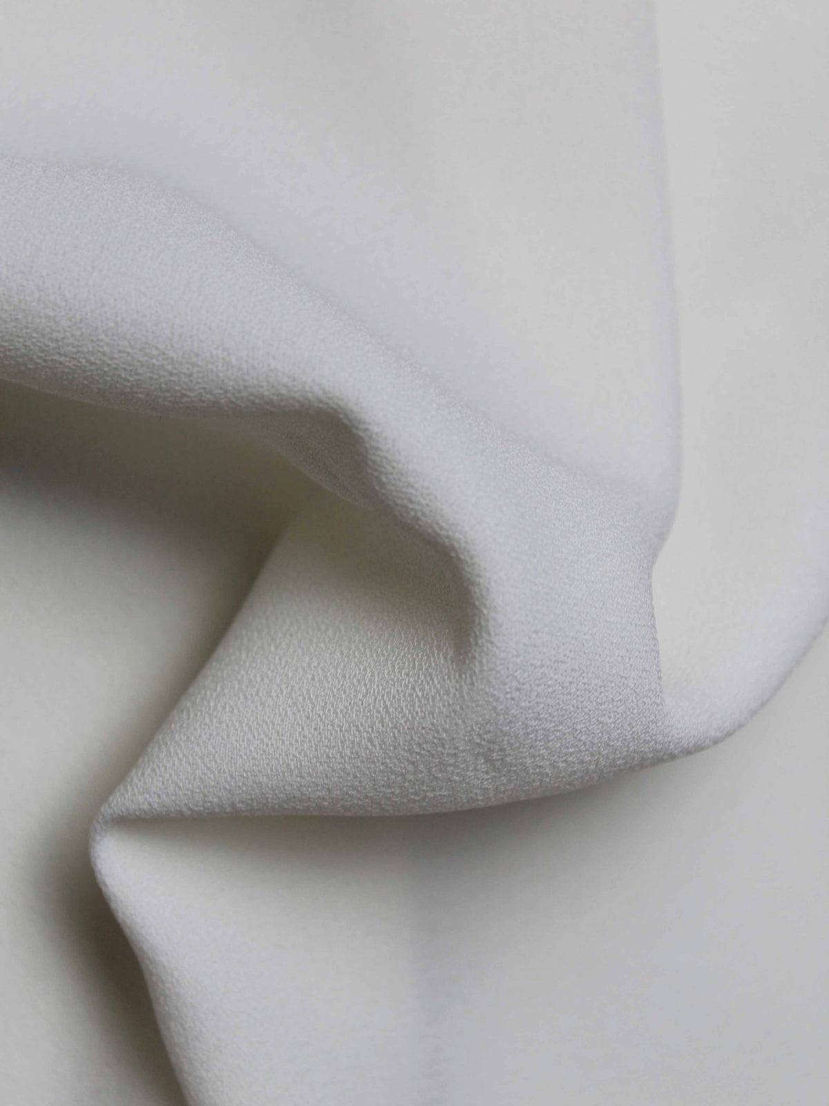 Crêpe polyester ivoire pâle, poids moyen - P59