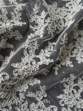 Dentelle cordée ivoire - P637