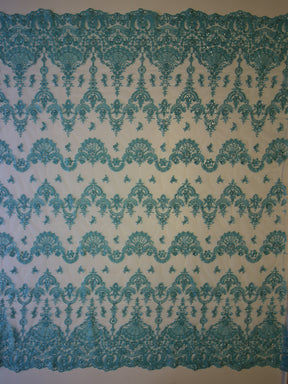 Dentelle Turquoise - Rubis.