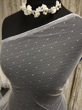 Dentelle Raschel ivoire - Magicien