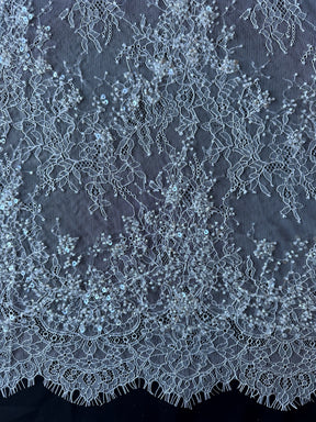Dentelle ivoire à cordons et paillettes - Fronnie 