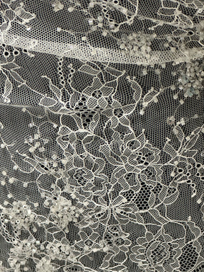 Dentelle ivoire à cordons et paillettes - Fronnie 