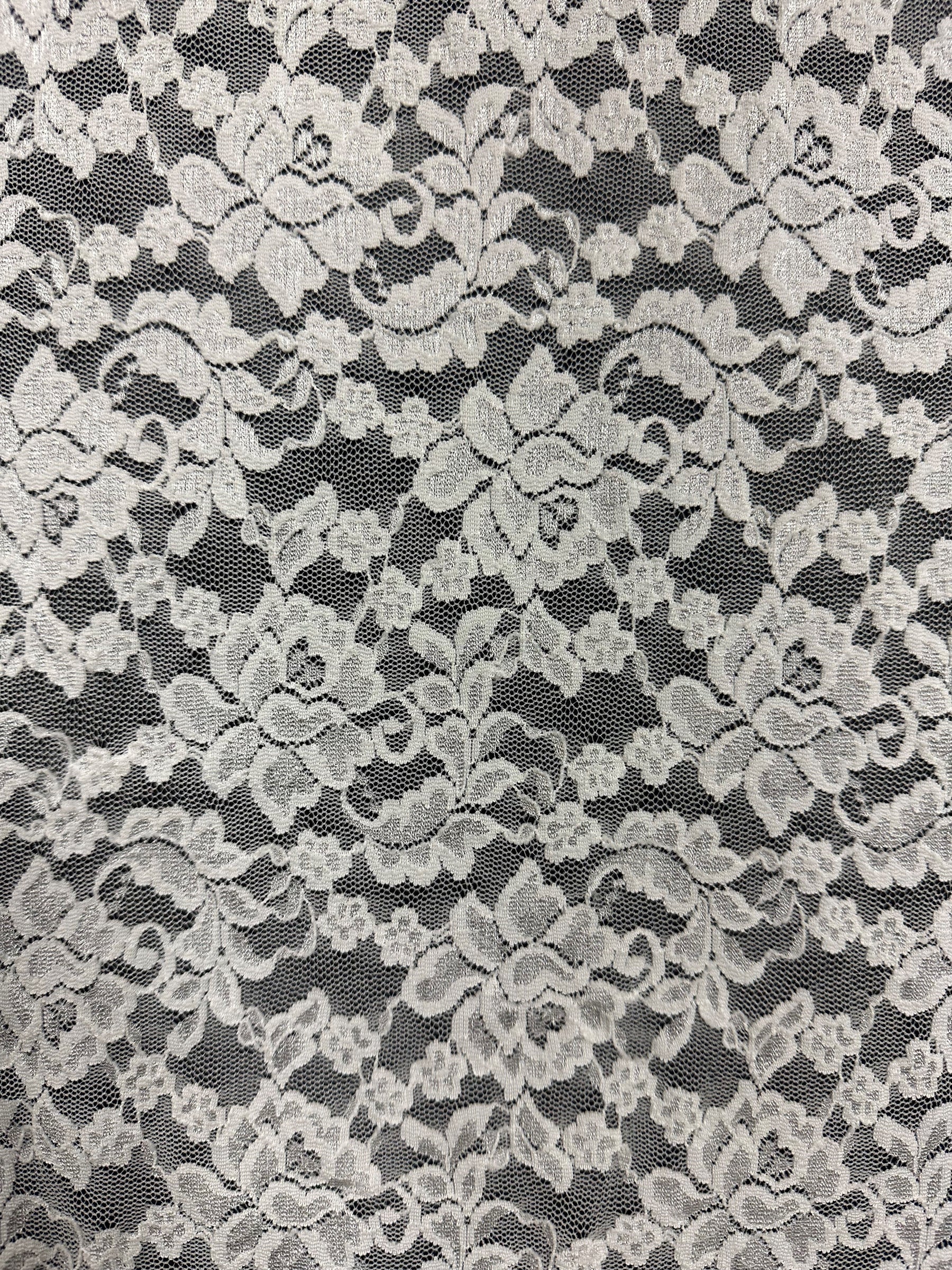 Dentelle Raschel extensible ivoire - Pérouse