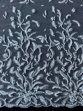 Oreiller en dentelle perlée ivoire