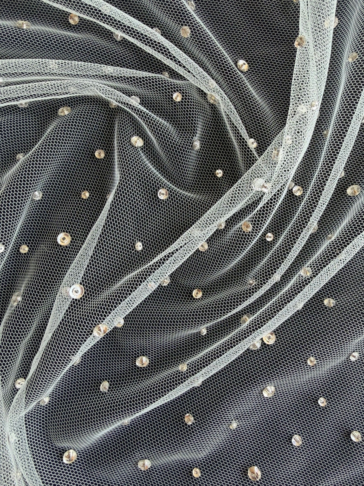 Tulle brodé de perles ivoire - EB1061