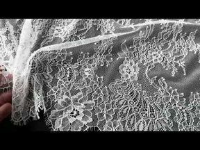 Dentelle Raschel ivoire - P223