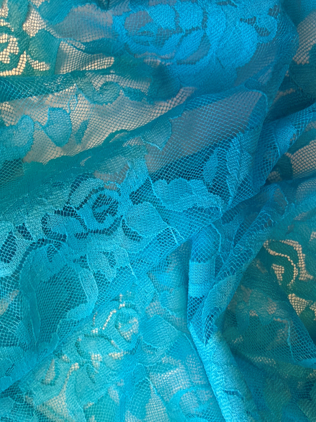 Dentelle Raschel extensible turquoise – Matina