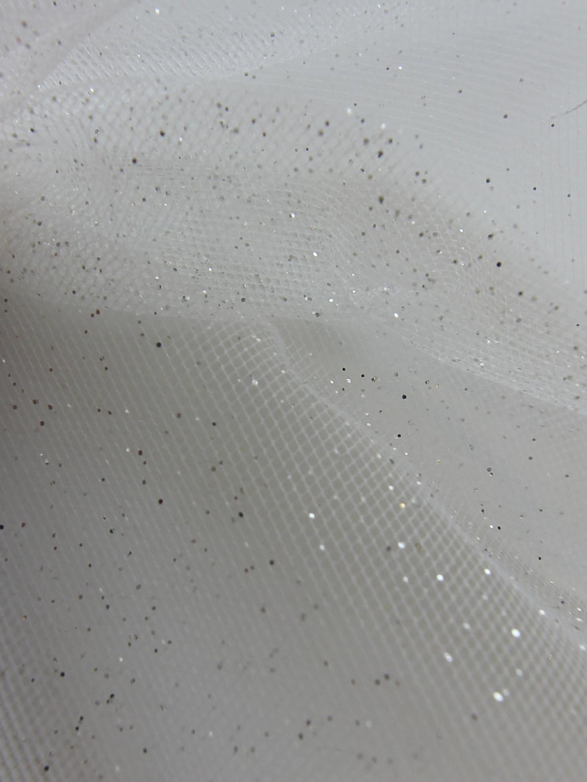 Tulle à paillettes argenté sur ivoire (300cm/119") - Effervescence