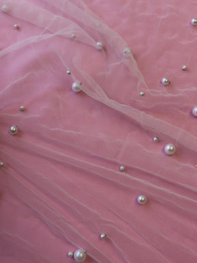 Tulle ivoire embelli de perles - Supremacy