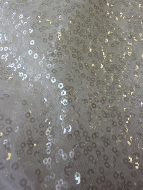 Tulle à paillettes ivoire – Animation