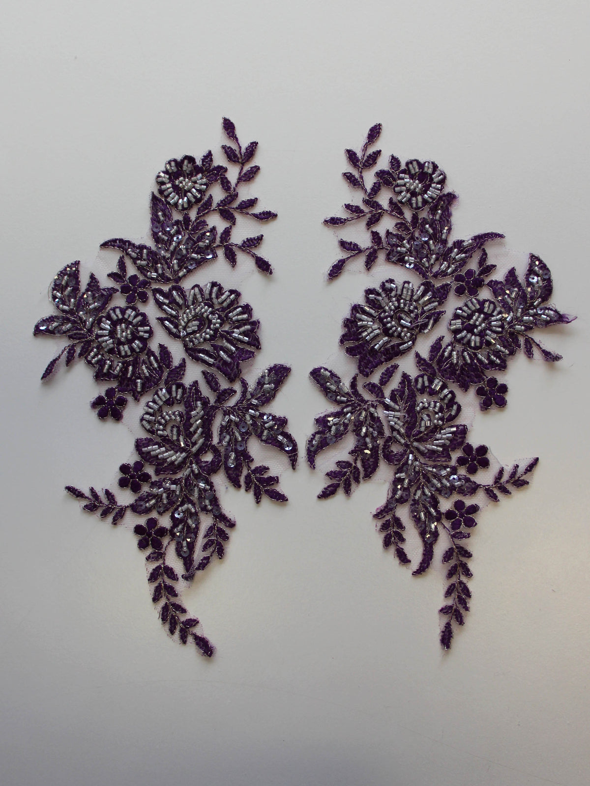 Appliques en dentelle violette – Nicole.